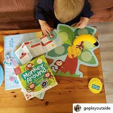 Children build eye/hand coordination and fine motor skills as they hang cute monkeys from a wobbling treetop! Monkey Around