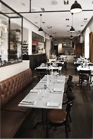 За окном красок достаточно, а добавить их в дом поможем мы! A Modern Bistro That Doubles As A Museum Remodelista Industrial Restaurant Design Bistro Design Restaurant Interior Design