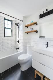 Marble bathroom with black hardware. Take A Look At The Best Bathroom Trends Of 2019