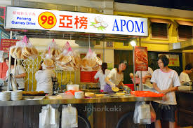 Kuantan nasi lemak is one of the more popular stalls in the food court, which explains why there's always a long queue. Malaysia Boleh Jurong Point Singapore Apom Stall