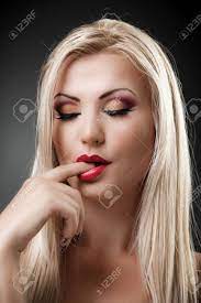Closeup Portrait Of A Beautiful Blond Woman Sucking Her Finger Stock Photo,  Picture and Royalty Free Image. Image 16324005.