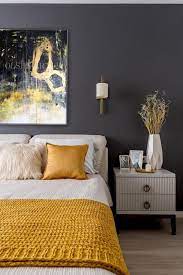The walls are a dark gray, which is more modern. 25 Cool Grey And Yellow Bedrooms That Invite In Digsdigs