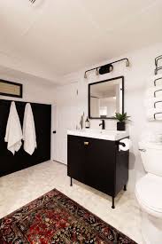 For instance, a media room, living wine cellar, wet bar, gym, office, playroom, mans cave, laundry and guest room are all popular choices for basement 22. Modern Budget Basement Bathroom Bright Green Door