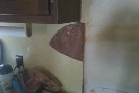 .build a kitchen counter back splash with formica right against the wall with a small piece of trim does anyone know if there is a feasible way to build a kitchen counter back splash with formica i need to redo a counter top over an old existing counter top which has the cap and cove detail already. Can I Tile Over Laminate Backsplash Whaciendobuenasmigas