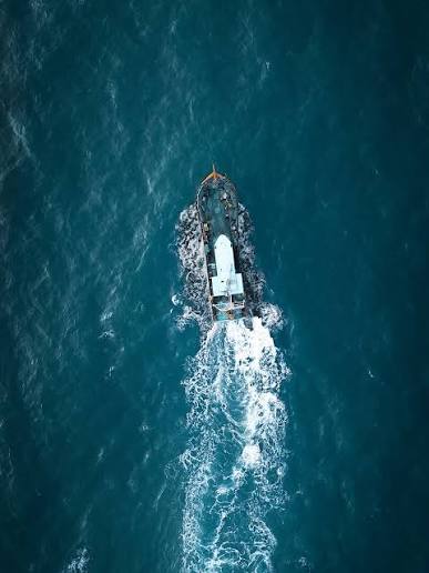 Fishing boats lie anchored along the Arabian Sea coast at Uttan Beach on the outskirts of Mumbai, Sunday, June 14, 2026, as the annual fishing season draws to a close ahead of
