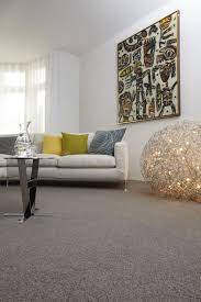 Grey Wool Carpet Creates A Good Base For Bright Accessories In This Modern Living Room Round Rug Living Room Living Room Carpet Living Room Colors