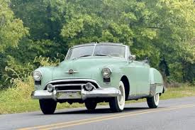 Image result for Scaraba Green 1930 Oldsmobile