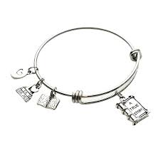 An opportunity arises for her to leave her home and move to the town of charm, ohio. Amazon Com Love To Read Charm Bracelet Book Club Gift Reading Stainless Steel Expandable Bangle Handmade Products