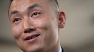 A police officer was accused of spying for China. The charges were dropped,  but the NYPD fired him