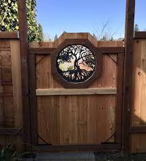 Custom Gate With Inset Metal Panel The Homeowner S Decorative Metal Wall Art Was Used As A Decorative Insert On Custom Gates Wood Gate Metal Wall Art Decor