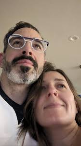 At the very least, they could have said: A simp for his feminist wife …the  one with the fabulous bangs