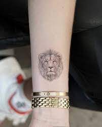 A simple lion tattoo is both powerful and consistent in terms of the silhouette and meaning. Perfect Small Lion Tattoo Small Lion Tattoos Small Tattoos Momcanvas