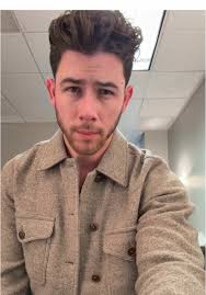 Nick Jonas Red Dress