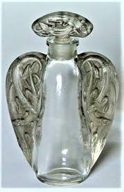 C 1912 Rene Lalique Scent Bottle Oreilles Lezards Of Clear Soft Triangle Shaped Container With A Froste In 2020 Lalique Perfume Bottle Perfume Bottles Lalique Perfume
