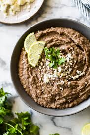 Lastly, pour in your beans and stock. Easy Refried Beans Isabel Eats Easy Mexican Recipes