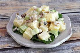 Chopped apples and bananas marinate in pineapple juice, and kiwi and strawberries are sliced. 14 Holiday Ready Fruit Salad Recipes