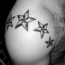 Brown ink three star tattoos on front shoulder. 111 Dazzling Star Tattoo Ideas With Mind Blowing Meanings And Secrets