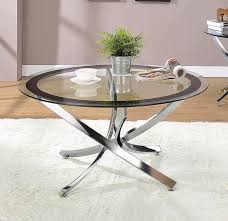 Glass top, black base and silver middle section make it a very modern, elegant addition to any living room. 702588 Wildon Home Yorkville Round Chrome And Black Finish Metal And Glass Coffee Table