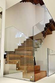 20 Glass Staircase Wall Designs With A Graceful Impact On The Overall Decor Modern Stairs Modern Staircase Staircase Design