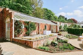 Stunning Outdoor Summer Wedding At The Walled Garden In Beeston Nottinghamshire Image By Sally Rose From Rose Imag Summer Wedding Outdoor Garden Wall Beeston