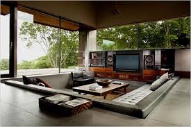 This area often has a table in the center as well. Conversation Pits Sunken Sitting Areas Sunken Living Room Cozy Living Room Design House Design