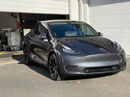 The tesla model 3 was introduced in the 2017 model year. 2021 Tesla Model Y Grey Metallic Detailership