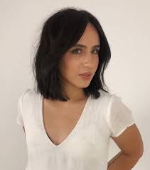 Dark Brunette One Length Lob With Long Curtain Bangs And Textured Ends The Latest Hairstyles For Men And Women 2020 Hairstyleology Brunette Hair Color Medium Length Hair Styles Short Hair With Bangs