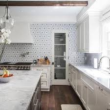 Ivory Kitchen Cabinets With Gray Walker Zanger Mosaic Tiles Transitional Kitchen Kitchen Trends Kitchen Cabinets And Backsplash Ivory Kitchen Cabinets