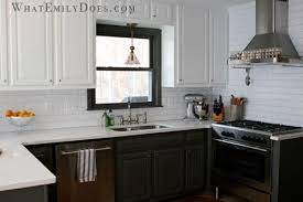 The top of the cabinet can be used for storage or display. Love The Black Cabinets Against All That White Could Use Some Bright Color Hot Pink Bright Orange Bright Kitchen Inspirations Kitchen Remodel Home Kitchens