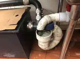 three comp sink to a grease trap