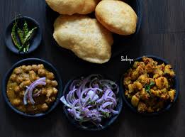 Chole bhature is a dish that is a hit at any party. Chole Bhature Chana Bhatura And Alu Subzi