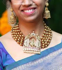 22 Carat Gold Five Line Rudraksha Beads And Gold Balls Necklace With Lord Krishna Pendant Stu Rudraksha Jewelry Diamond Jewelry Earrings Pearl Necklace Designs