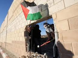 The war between israel and palestinian militant groups seems to have spilled over into the us, as two groups or rival demonstrators got into a physical altercation outside the israeli consulate in new york. Palestinians Knock Hole Through Israeli Barrier 25 Years After Fall Of Berlin Wall The Independent The Independent