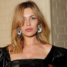 Abbey Clancy is an absolute bombshell in daring swimsuit