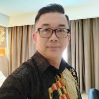 Judi Dharmawan, CFP®