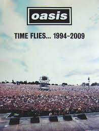 Which is perhaps why a shot from the show has been chosen to adorn 'time flies' the band's new (posthumous) singles collection. Oasis Time Flies 1994 2009 Poster Gaya Kasual