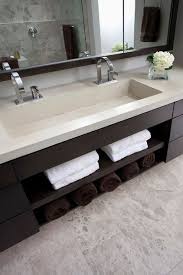 With a modern, masculine vision this idea pops right off the counter top providing a compliment. The Sink Is Integrated Into One Long Piece Of Concrete And Has His And Her Faucets The Countertop With The B Bathrooms Remodel Bathroom Design Modern Bathroom