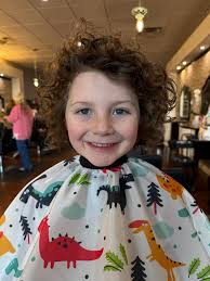 Lake decided it was time for a haircut. We let our kids decide and they  have such fantastic hair that they can really rock any style they chose, so  it's all good.