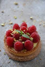 Raspberry And Pistachio Tartelette With Vanilla Pastry Cream And A Thin Layer Of White Chocolate Sweet Tarts Desserts Food