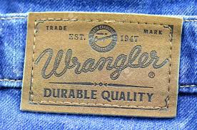 Closeup Of Wrangler Label On Blue Jeans Stock Photo Picture And Royalty Free Image Image 40484971 Now i bought a new pair in dec of. closeup of wrangler label on blue jeans