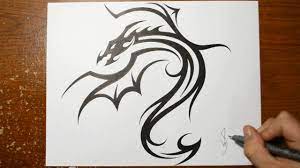 Dragon artwork dragon head drawing realistic dragon drawing cool dragon drawings dragon pictures mythological creatures mythological monsters magical creatures creature design. Designing A Cool Tribal Dragon Tattoo Design Drawing 1 Youtube