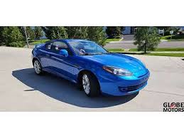 Image result for Carbon Blue 2003 Tiburon