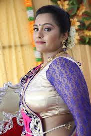 South indian actress anasuya bharadwaj latest photoshoot stills in black saree. South Indian Actress Hot Cleavage Photos