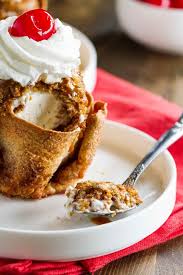 After you make sure they are all well coated, arrange the tortillas on a cooling rack over a lined cookie sheet. Fried Ice Cream With Cinnamon Tortilla Bowls Taste And Tell