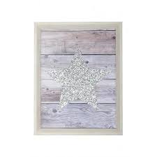 Donnez une nouvelle vie à votre décoration grâce à une toile encadrée personnalisée. Photo Encadree Etoile Pailletee 30x40 Cm