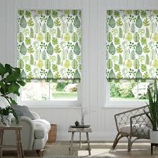 For windows in tropical homes, it's better to avoid wooden window frames, as this material can easily rot and warp in a tropical climate's moist environment. Tropical Leaves Moss Roman Blind