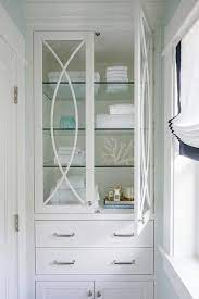 Linen closets | style at home. Built In Glass Front Linen Cabinet With Glass Shelves Transitional Bathroom