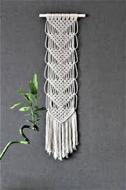 Maybe you would like to learn more about one of these? Macrame Wall Hanging On Bamboo Bohemian Macrame Wall Hanging Etsy Macrame Wall Hanging Macrame Patterns Macrame Design