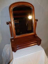 There is no debating that this is a lovely and charming antique porcelain backed vanity hand mirror and brush set from the late victorian era to the turn of the 1900's. Antiques Atlas Antique Victorian Mahogany Vanity Mirror