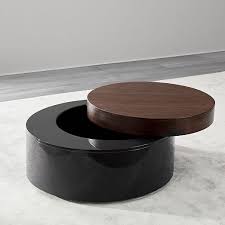 A modern take on a trunk, this hyde coffee table offers plenty of hidden treasures as it's top and side open up to reveal storage for your bottles and barware, while a smooth marble top offers a place to pour drinks straight from the sofa. Pin On Home Projects